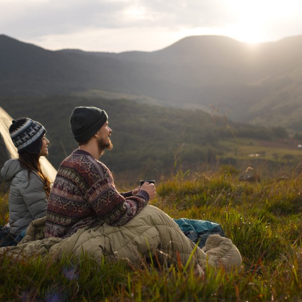 full-shot-adventurous-couple-bivouacking